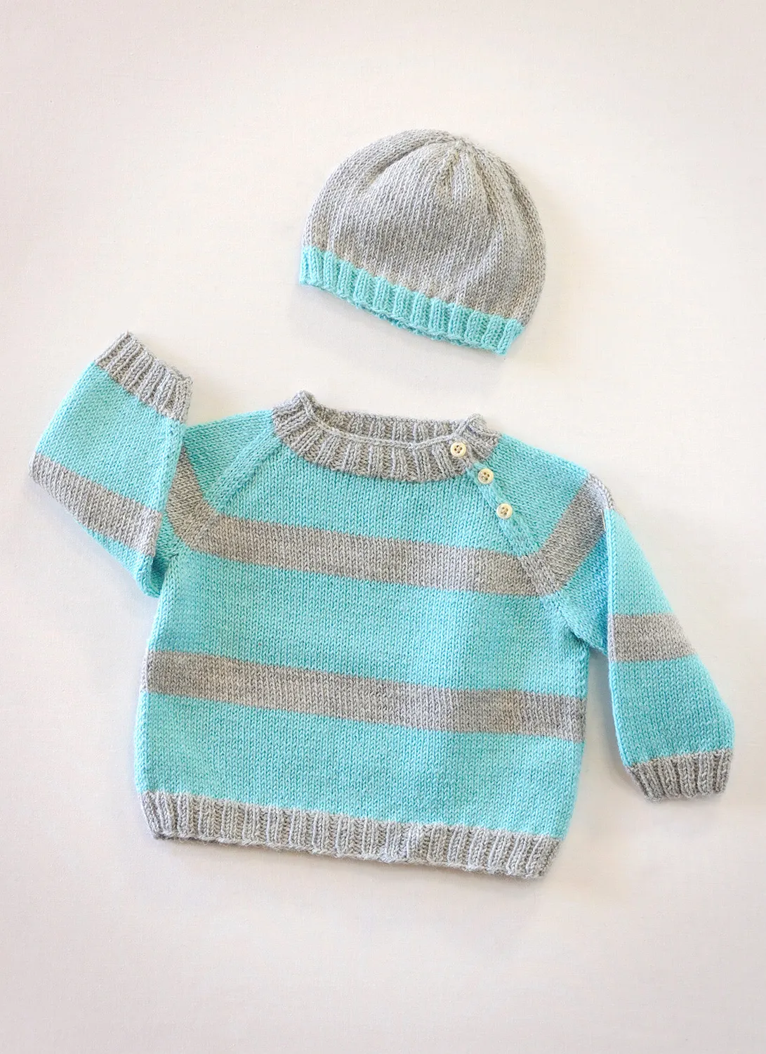 Blue Sky Fibers Busy Baby 9817 Strickanleitung Babyset Pullover Mütze